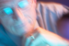 A blurry image of a man, as if having a seizure